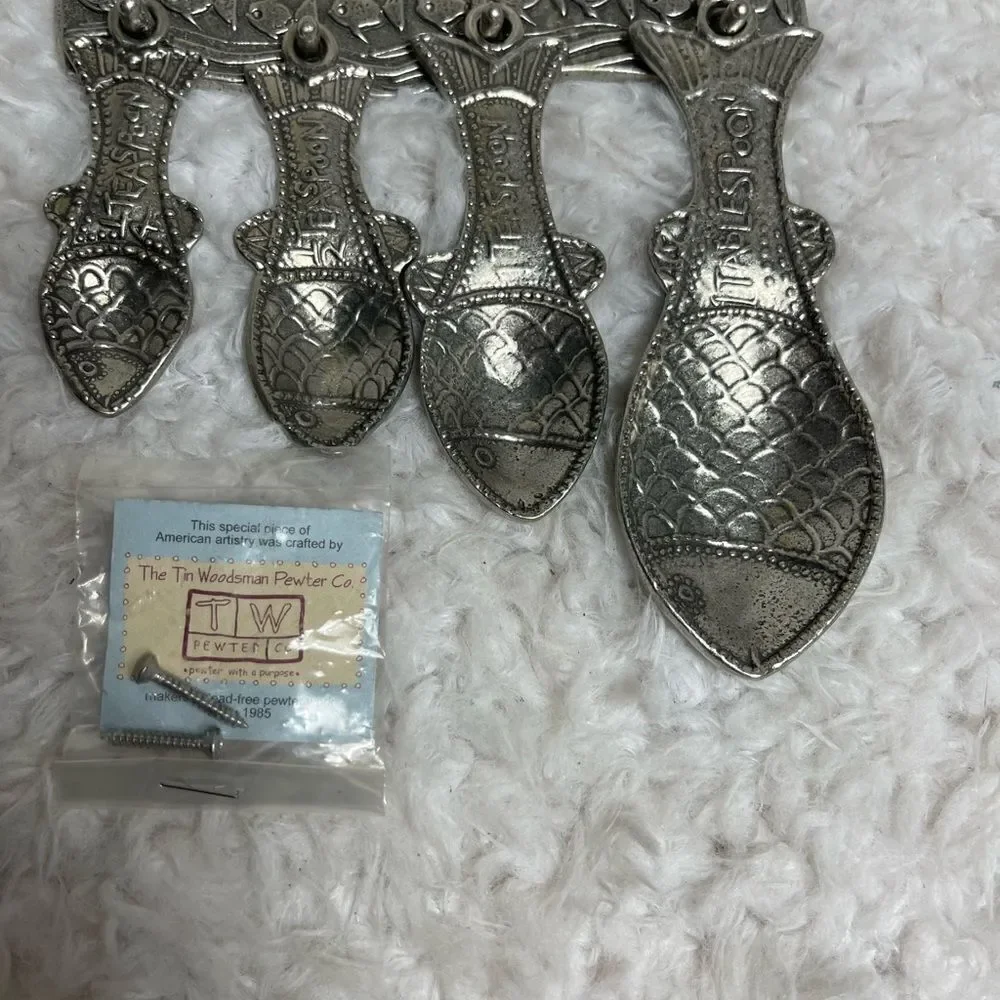Vintage Tin Woodsman TWpewter set of four Fish measuring spoons with wall hanger